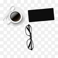 办公桌桌面摆放手机眼镜咖啡