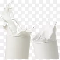 牛奶有机食品奶油乳制品饮料.两杯牛奶碰撞