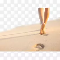 脚印沙滩上唯一的女人沙滩图片上的脚印