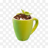 绿色陶瓷杯装的盆栽奶茶