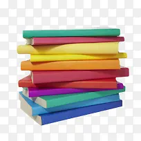 纯色堆叠不整齐的一叠书实物