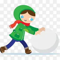 冬季推雪球的小男孩
