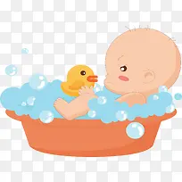 澡盆里玩小鸭子的孩子