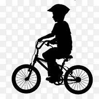 儿童带头盔骑自行车剪影