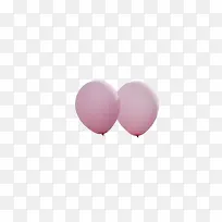空中的一对粉色气球
