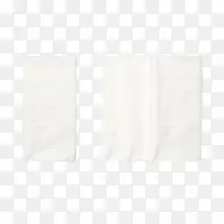 两张白色带褶皱的纸巾实物