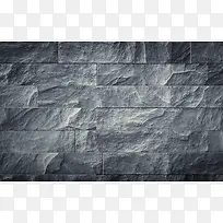 灰色凹凸不平砖墙海报背景
