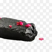 黑色石头上的花卉