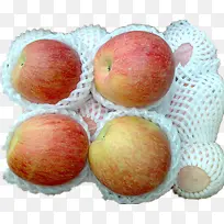 几个被泡沫袋包裹的苹果