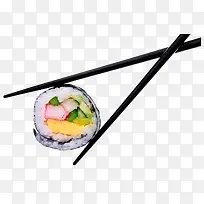 筷子夹起的寿司