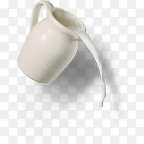 白色的陶瓷瓶装着新鲜的牛奶