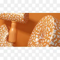 橘色字母背景瓶子